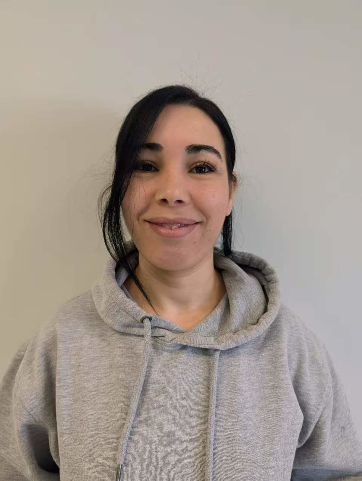 Professional portrait of Kahina, administrative coordinator and educational support at Garderie Ami Câlin in Aylmer, Gatineau.